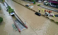 Deaths Reported From ‘Red Alert’ Flooding in Beijing, Thousands Flee