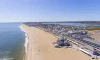 A Small Plane Towing a Banner Lands in the Ocean Off a Crowded New Hampshire Beach; Pilot Unhurt