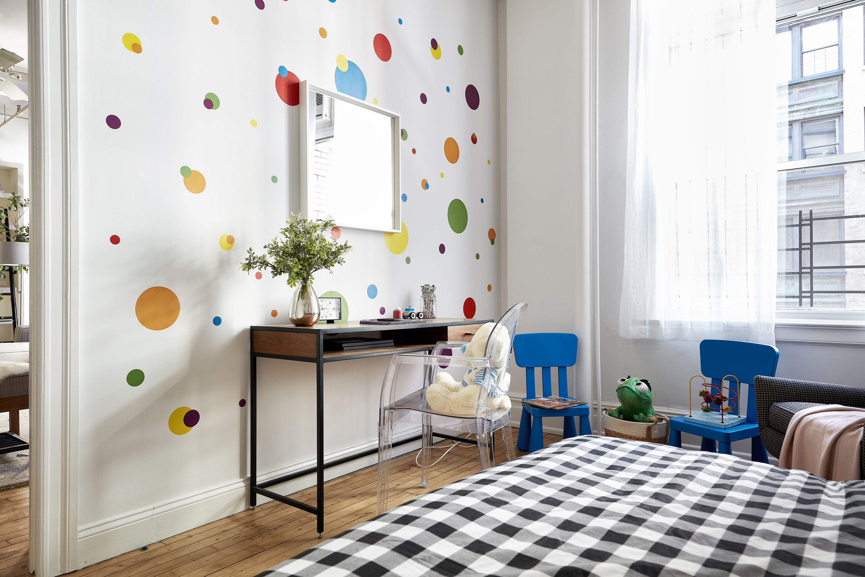 Removable wall stickers help make a children's room come to life.