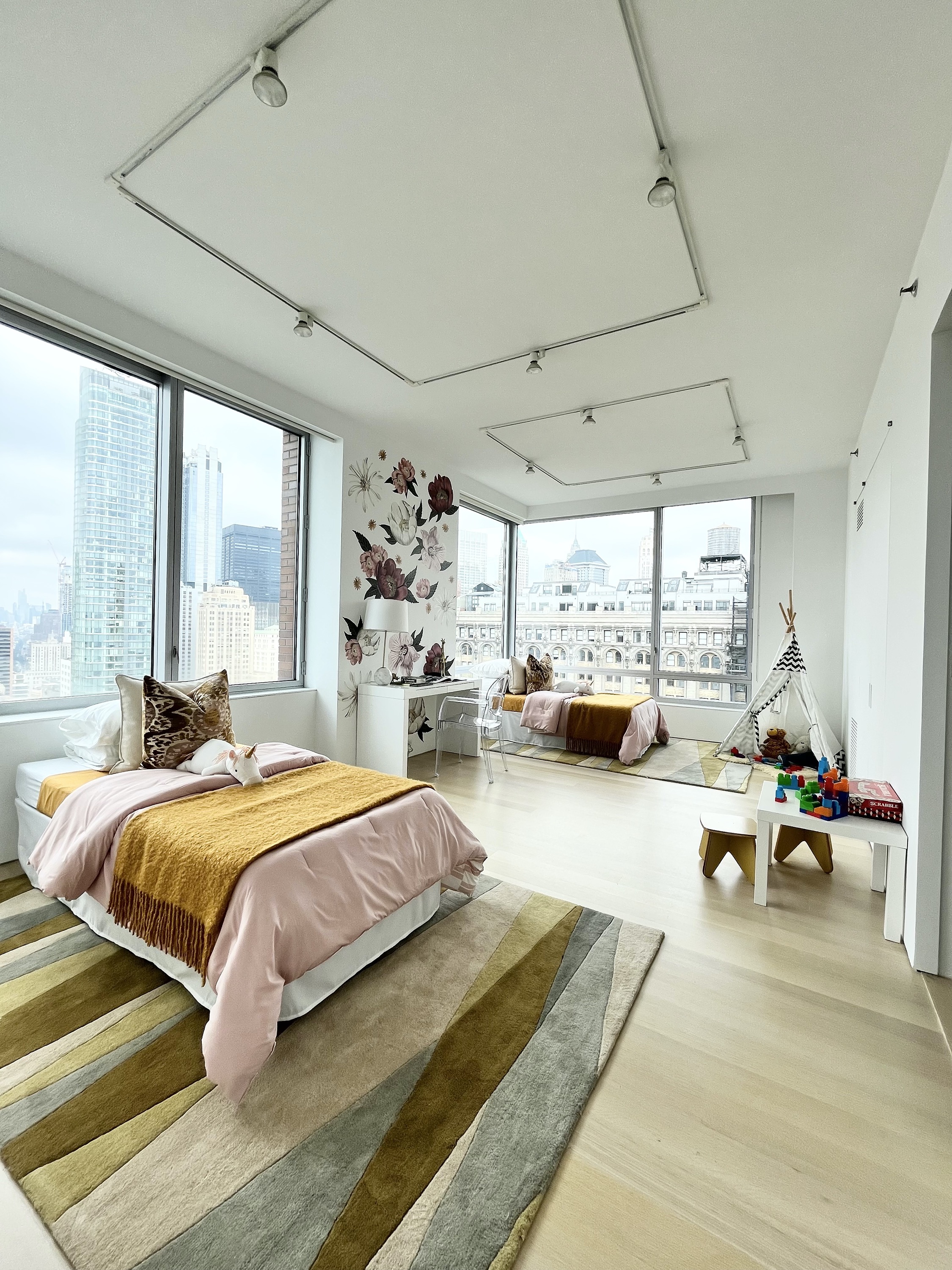 Wall stickers help substitute for wallpaper in this children's room.