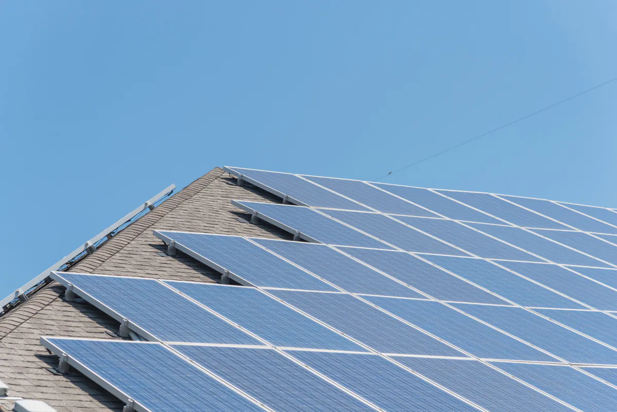 Rooftop solar panels are an effective way to both prevent heat from getting through your roof and repurpose that energy to power your home. (Dreamstime/TNS)