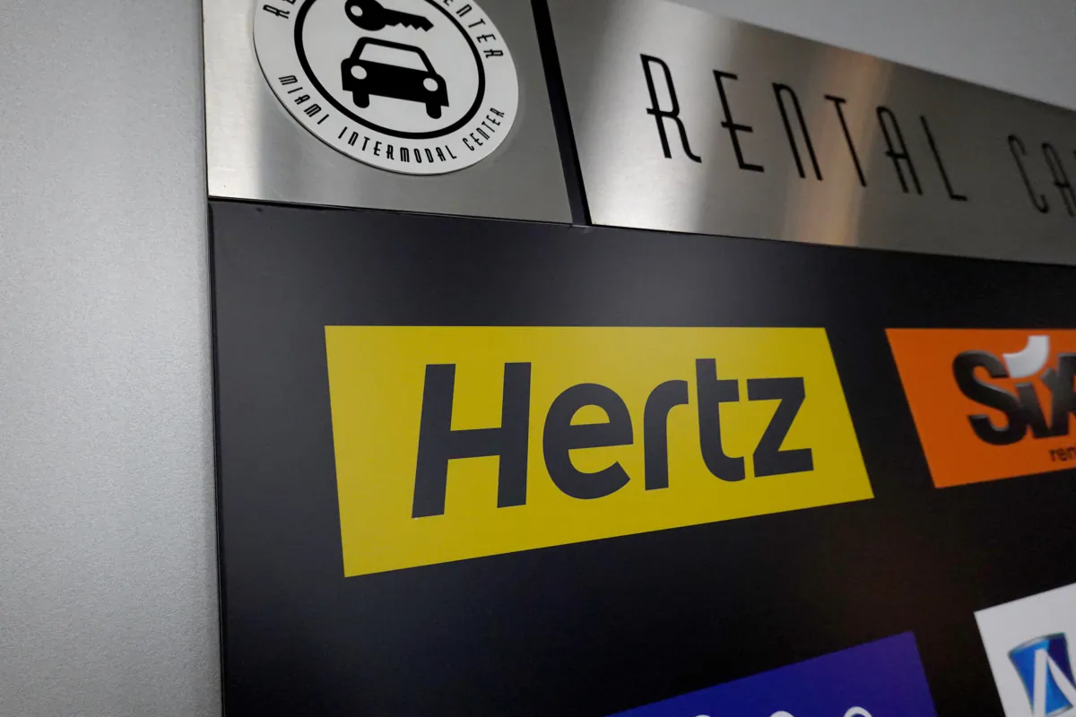 A Hertz car rental sign in the Miami International Airport on Oct. 25, 2021, in Miami. (Joe Raedle/Getty Images/TNS)