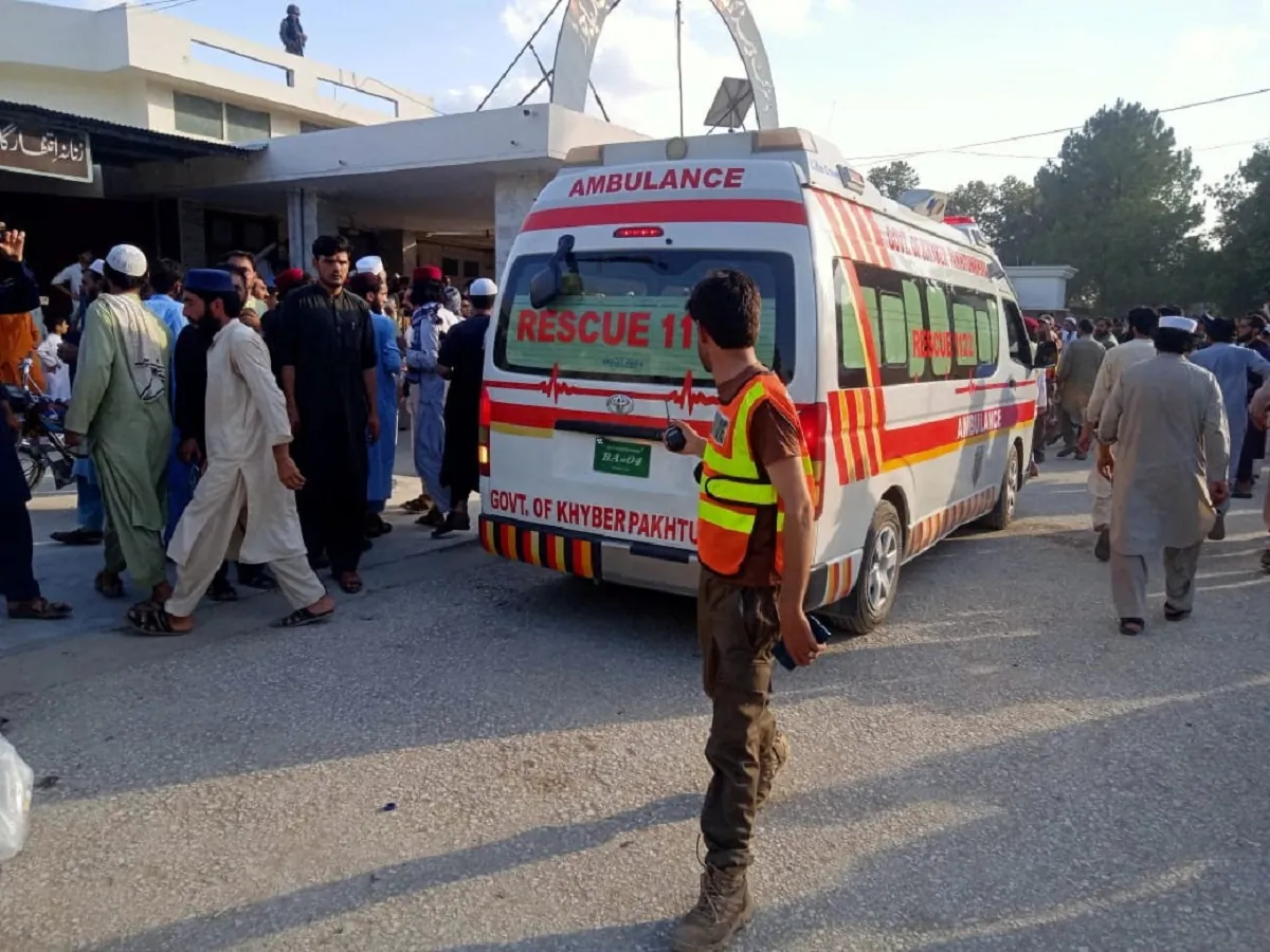 An ambulance carries the injured to the hospital after a blast in Bajaur district of Khyber Pakhtunkhwa province, Pakistan, on July 30, 2023. (Rescue 1122/Handout via Reuters)