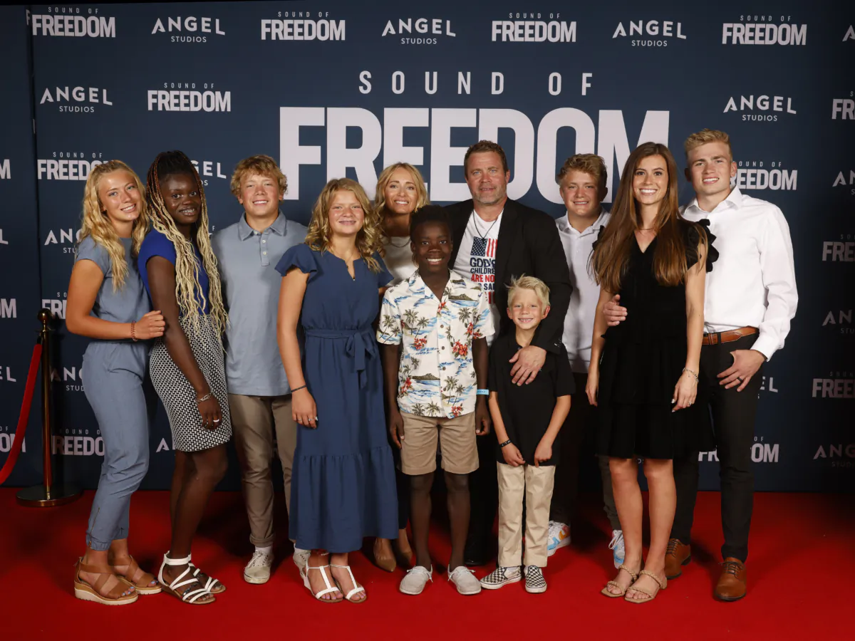 Tim Ballard poses with friends and family during the premiere of "Sound of Freedom" in Vineyard, Utah, on June 28, 2023. (Fred Hayes/Getty Images for Angel Studios)