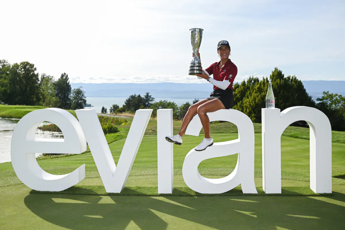 Celine Boutier of France celebrates with the Amundi Evian Championship trophy following victory in the Amundi Evian Championship at Evian Resort Golf Club in Evian-les-Bains, France, on July 30, 2023. (Stuart Franklin/Getty Images)