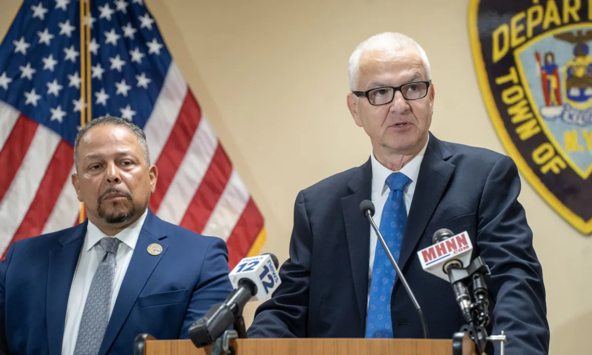 Town of Wallkill Police Chief Robert Hertman (R) and Supervisor George Serrano at a press conference in Middletown, N.Y., on July 28, 2023. (Cara Ding/The Epoch Times)