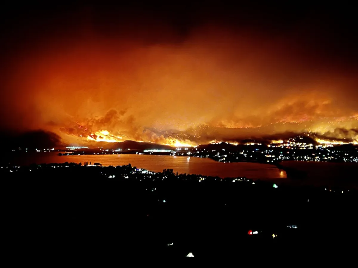 The Eagle Bluff wildfire is seen burning from Anarchist Mountain, outside of Osoyoos, B.C., in a July 29, 2023, handout photo. (The Canadian Press/HO-Michelle Genberg)