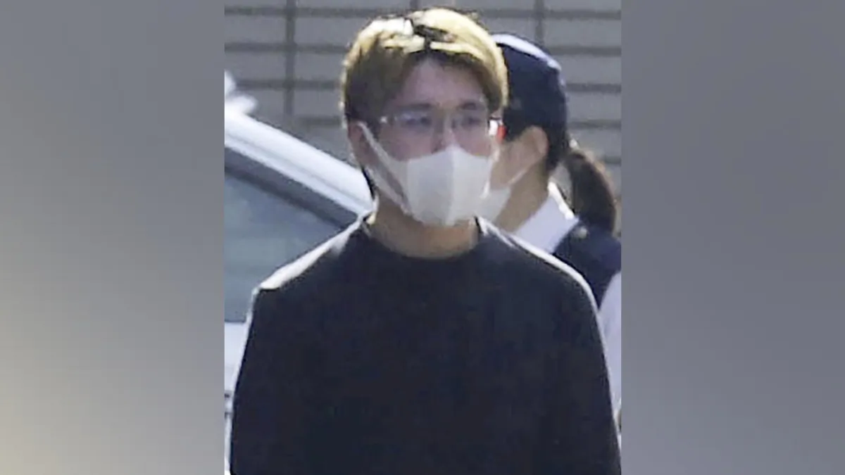 Kyota Hattori at the Chofu police station in Chofu, a Tokyo suburb, on March 4, 2022. (Kyodo News via AP)