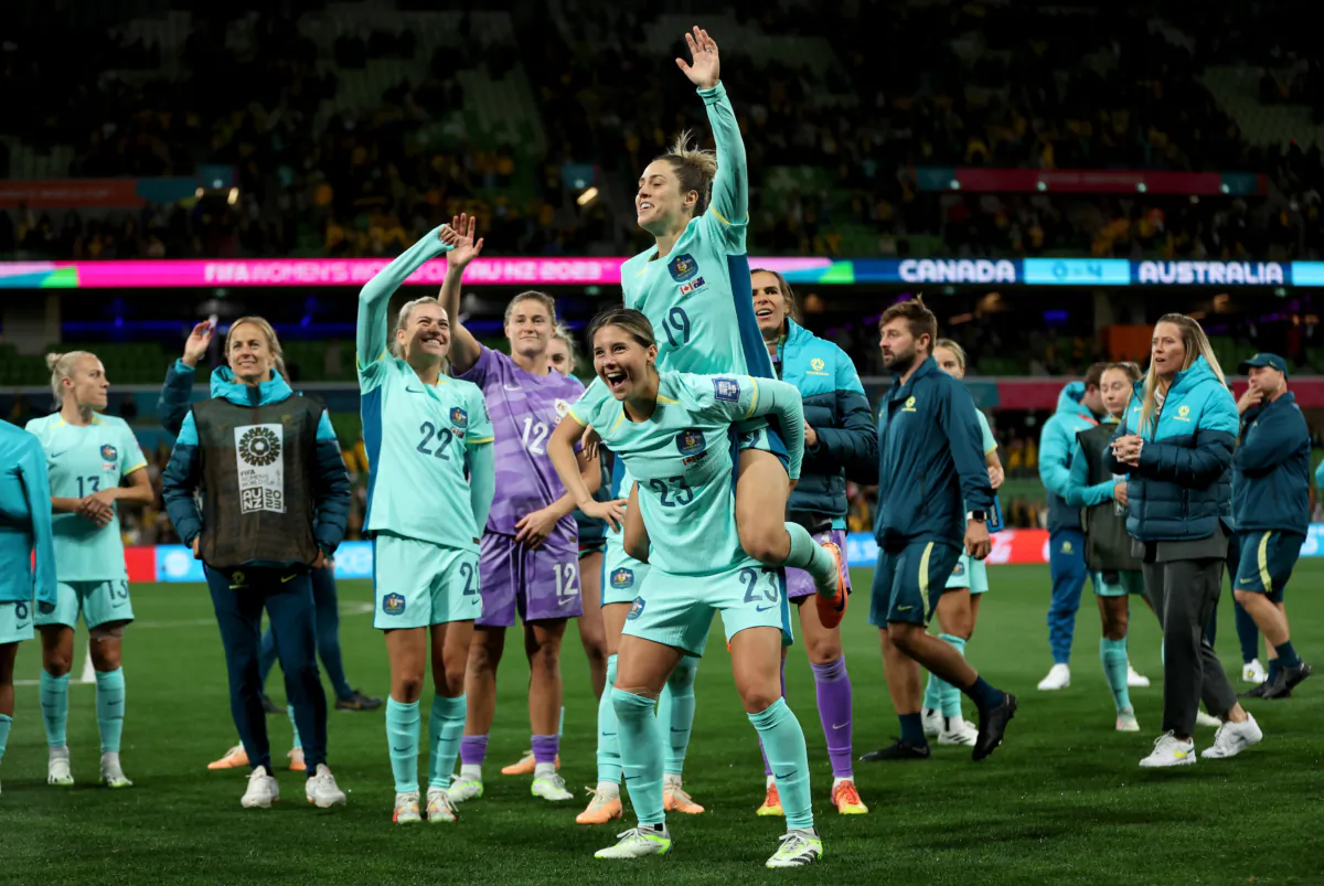 Australia players applaud fans after the team's 4–0 victory and qualification for the knockout stage following the FIFA Women's World Cup Australia & New Zealand 2023 Group B match between Canada and Australia at Melbourne Rectangular Stadium in Melbourne, Australia, on July 31, 2023. (Robert Cianflone/Getty Images)