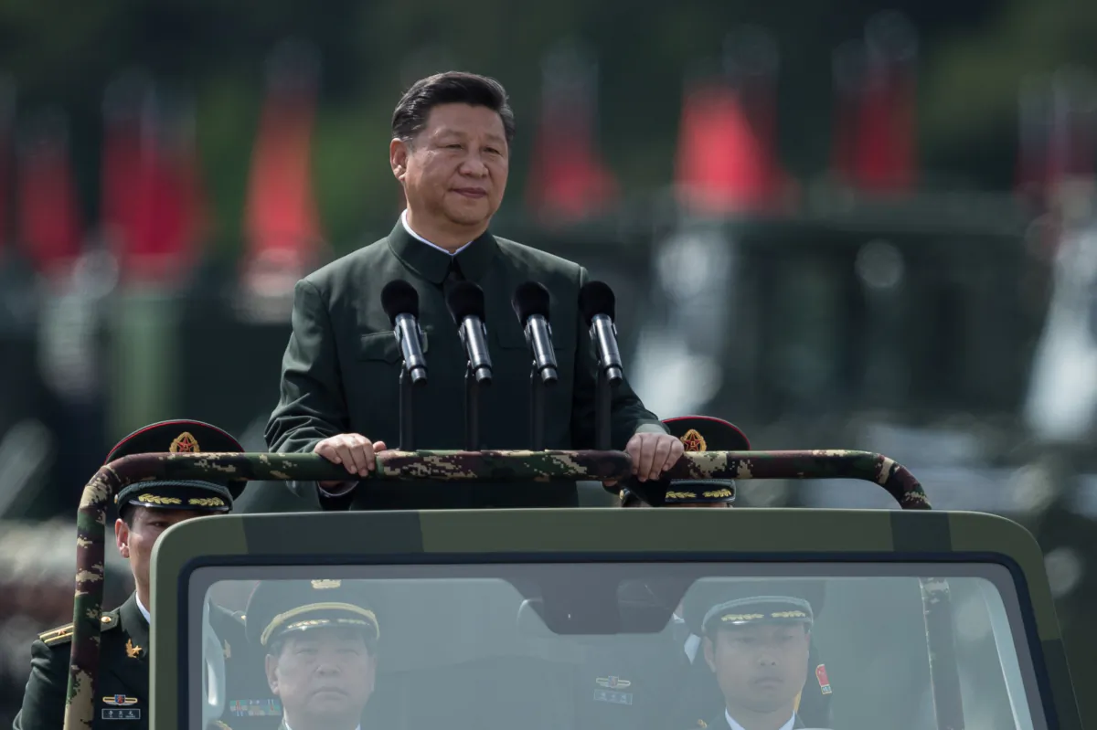 Chinese leader Xi Jinping inspects People's Liberation Army soldiers at a barracks in Hong Kong on June 30, 2017. (Dale De La Rey/AFP via Getty Images)