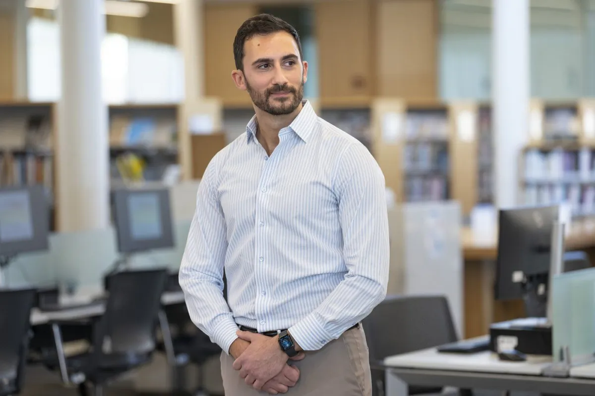 Ontario Education Minister Stephen Lecce waits for his introduction before speaking to the media at an Etobicoke library, in Toronto on April 16, 2023. (Chris Young/The Canadian Press)