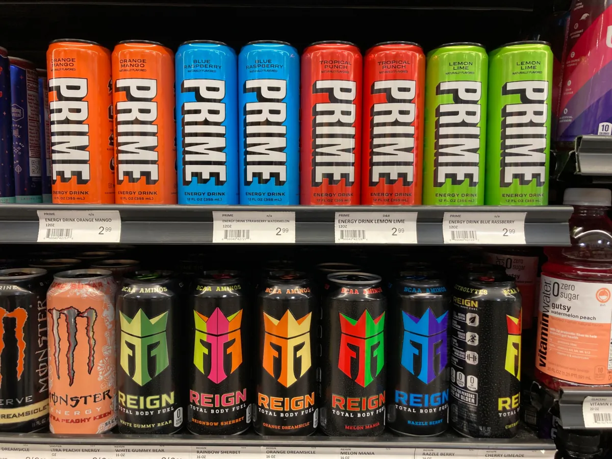 Prime energy drinks are displayed with other energy drinks at a grocery store in Detroit on March 24, 2023. (Carlos Osorio/AP Photo)