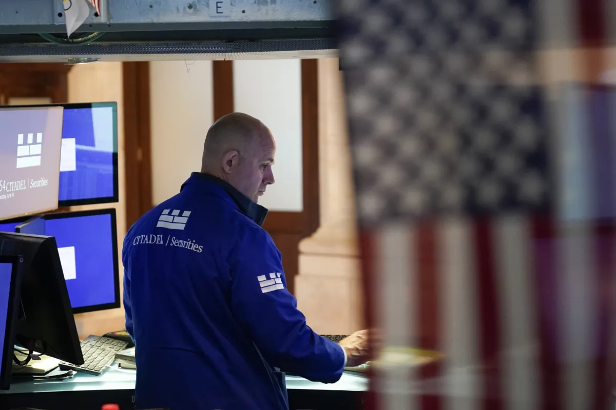 Traders work on the floor at the New York Stock Exchange in New York on June 14, 2023. (Seth Wenig/AP Photo)