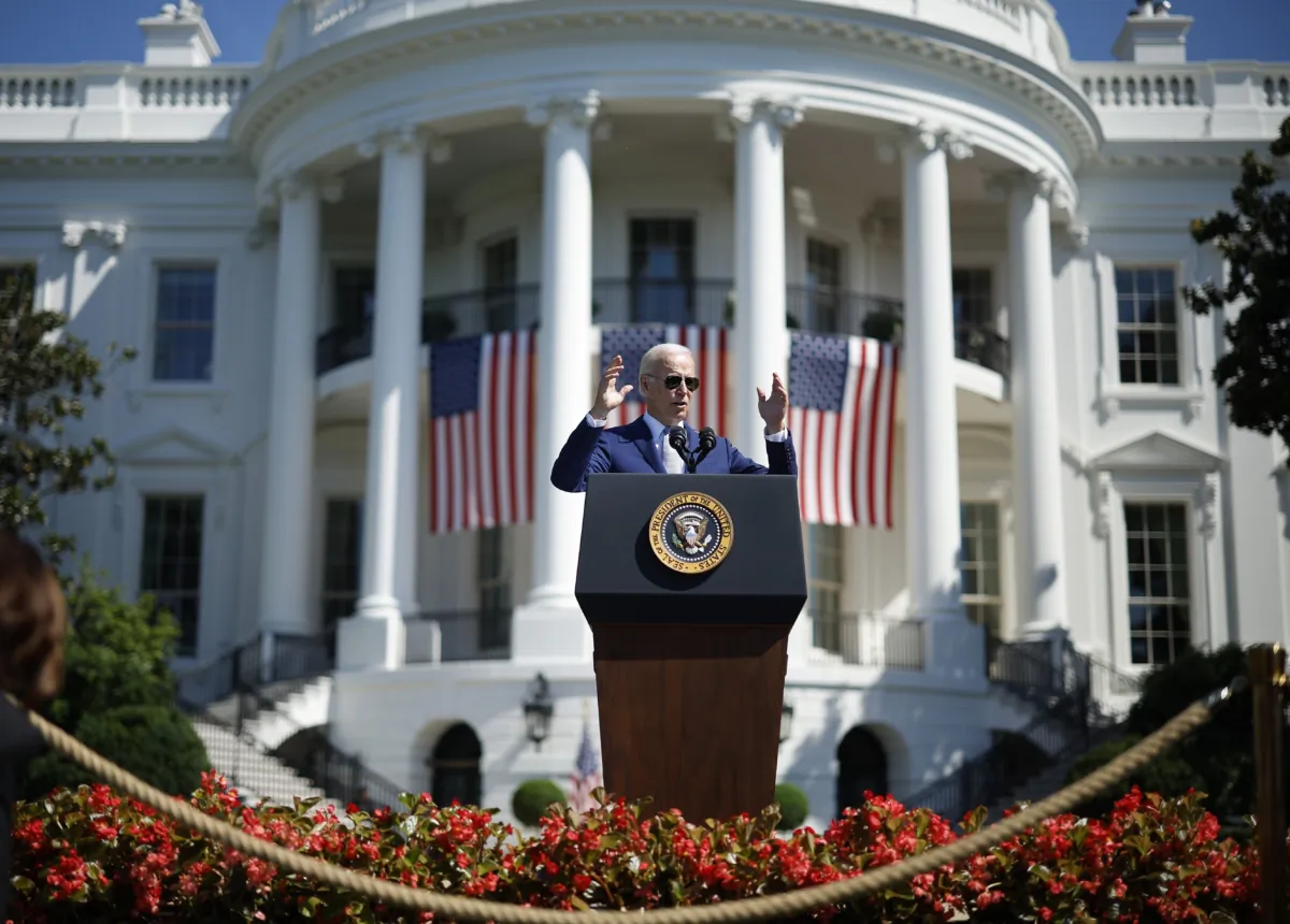 U.S. President Joe Biden speaks before signing the CHIPS and Science Act of 2022 during a ceremony on the South Lawn of the White House on Aug. 9, 2022. The centerpiece of the legislation is $52 billion in funding aimed at boosting U.S semiconductor chip manufacturing and continued scientific research in the field to better compete with China, which is increasingly dominant in the sector. (Chip Somodevilla/Getty Images)