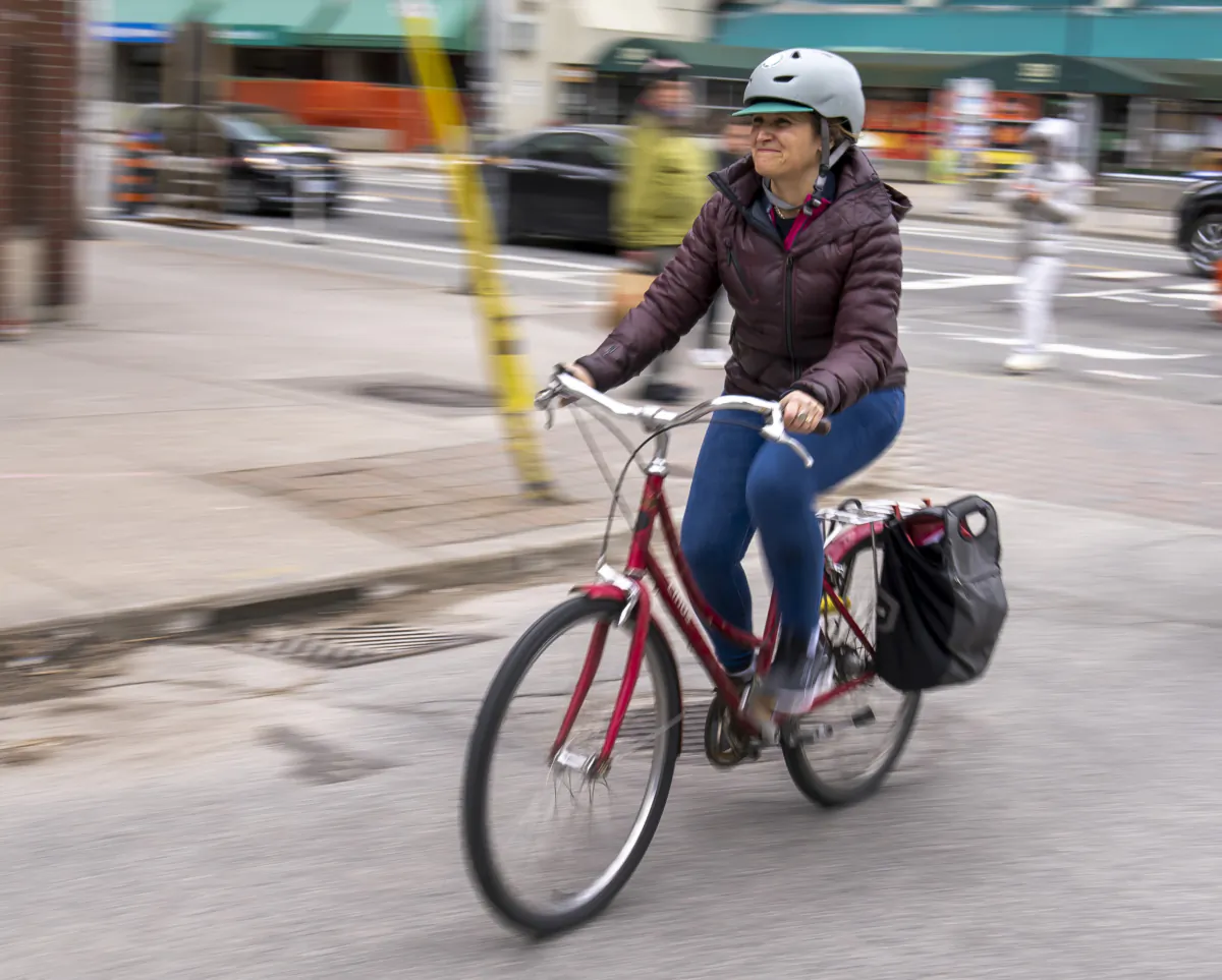 Deputy Prime Minister Chrystia Freeland rides away on her bicycle after grocery shopping in Toronto on April 3, 2023. (Frank Gunn/The Canadian Press)