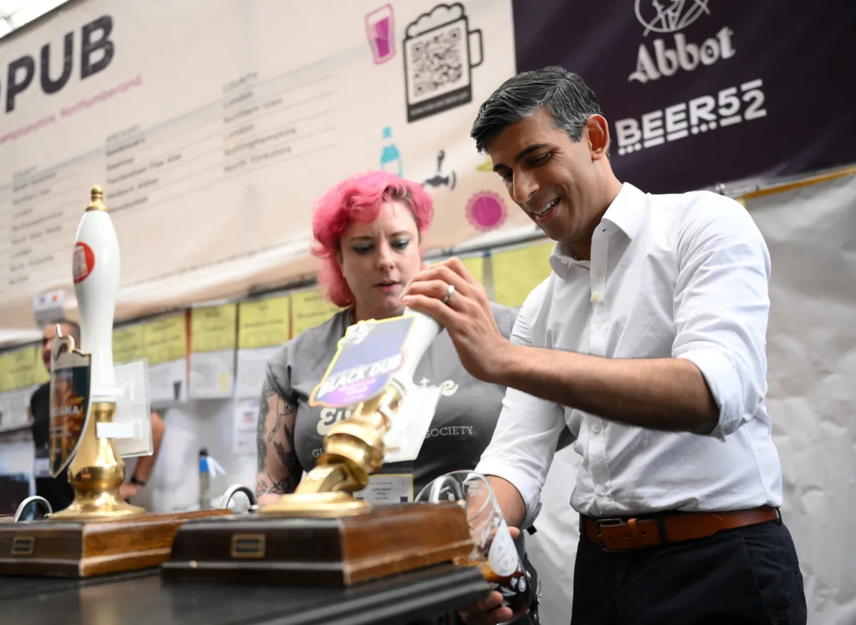 Prime Minister Rishi Sunak during a visit to the Great British Beer Festival at Olympia, in London on Aug. 1, 2023. (Daniel Leal/PA)