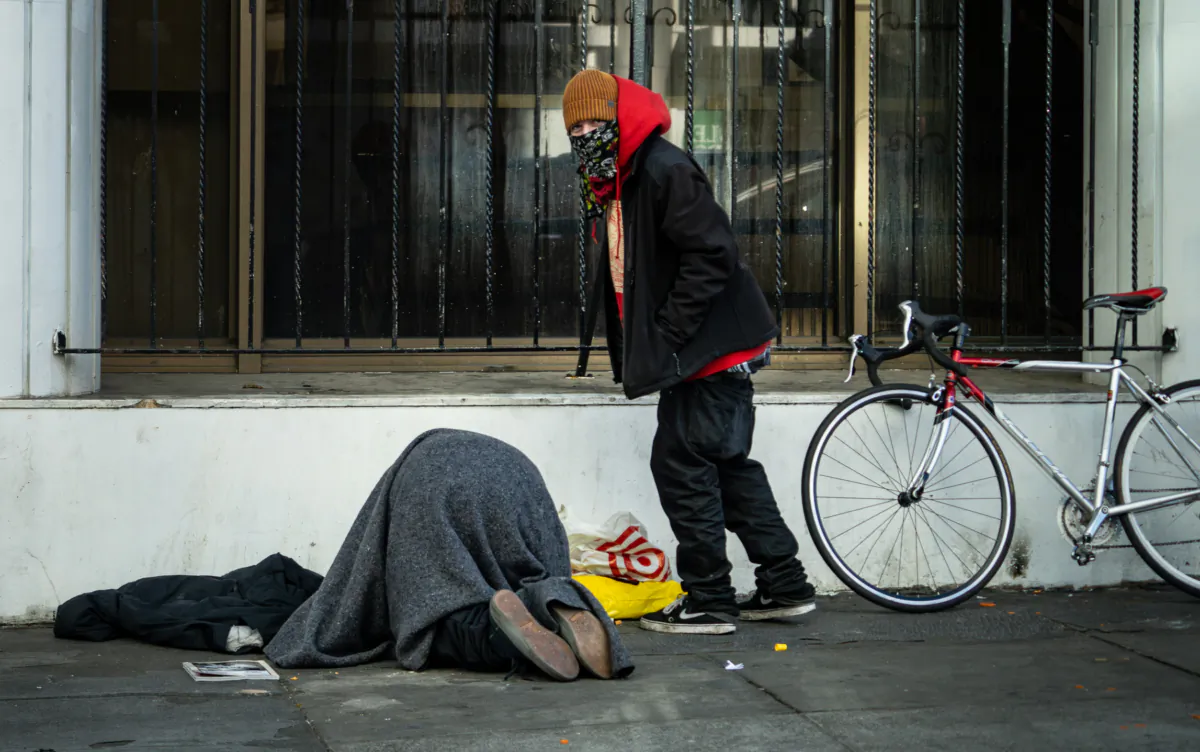 Homeless men in San Francisco, Calif., on Feb, 22, 2023. (John Fredricks/The Epoch Times)