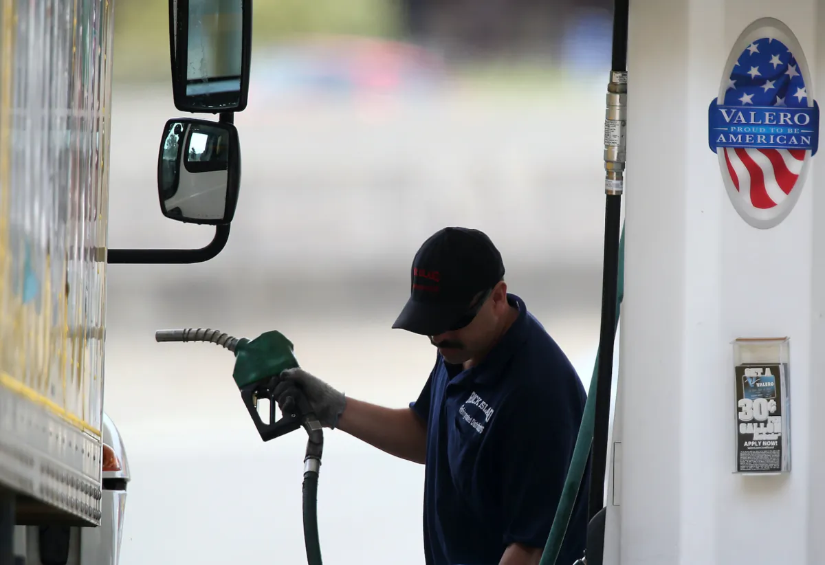 A customer prepares to pump fuel into his truck at a Valero gas station in Mill Valley, Calif. on July 22, 2013. (Justin Sullivan/Getty Images)