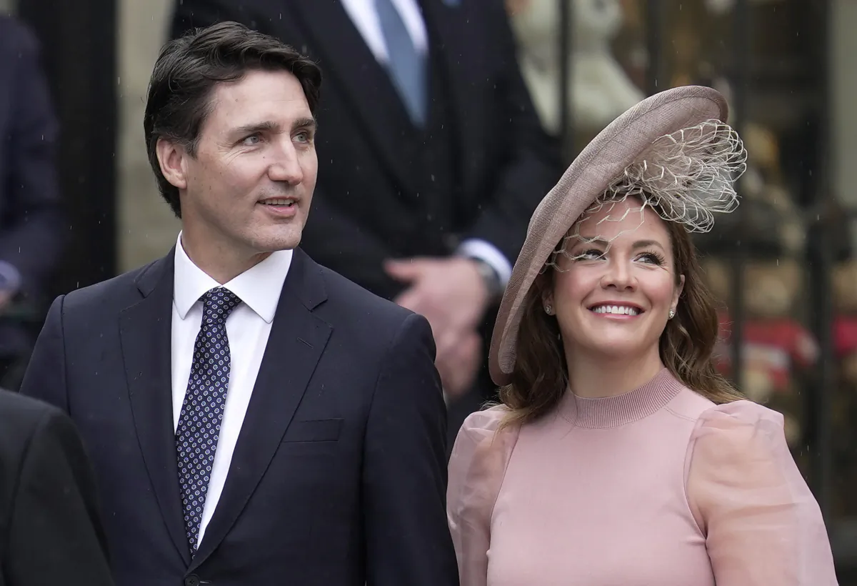 Prime Minister Justin Trudeau and Sophie Grégoire Trudeau arrive at Westminster Abbey prior to the coronation ceremony of Britain's King Charles III in London on May 6, 2023. (AP Photo/Kin Cheung)