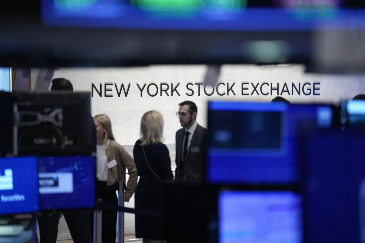 A sign is displayed on the floor of the New York Stock Exchange in New York on June 14, 2023. (Seth Wenig/AP Photo)