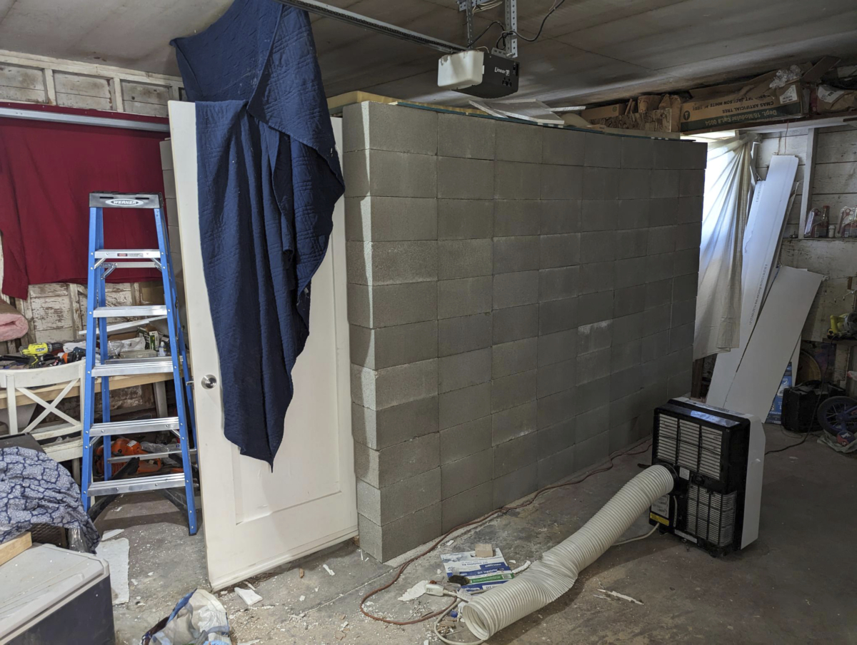 A makeshift cinderblock cell