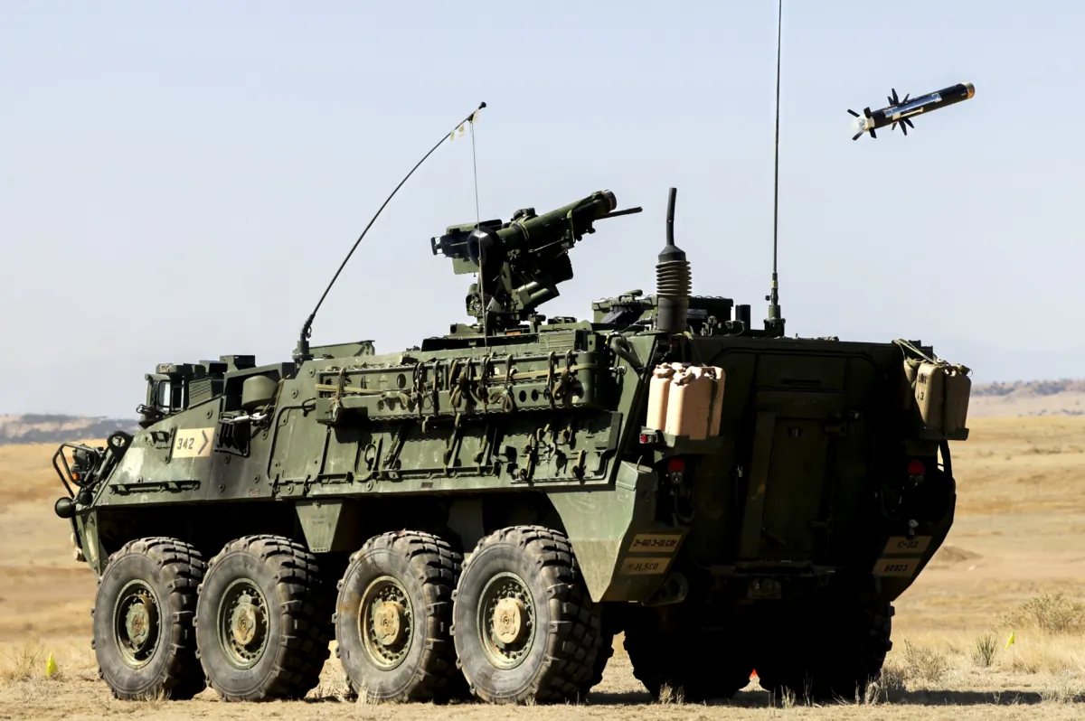 Members of the 2nd Stryker Brigade Combat Team fire a Javelin missile from a Stryker Infantry Carrier Vehicle during a live-fire training exercise in Fort Carson, Colo., on April 28, 2022. (Michael Ciaglo/Getty Images)