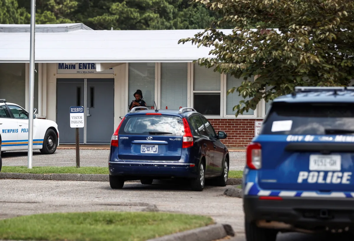 Memphis police officers work the scene of a shooting at Margolin Hebrew School in Memphis, Tenn., on July 31, 2023. (Mark Weber/Daily Memphian via AP)