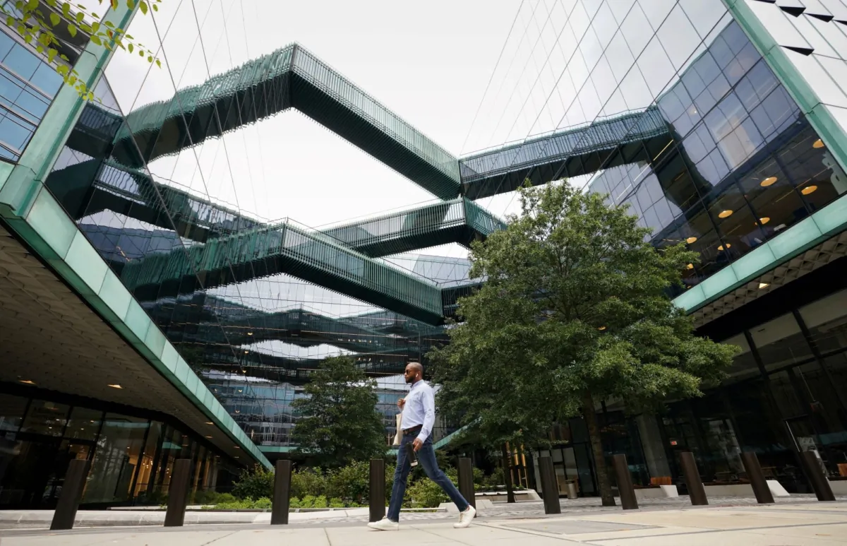 A man walks through a plaza at the new Fannie Mae headquarters in Washington on Oct. 4, 2022. (Kevin Lamarque/Reuters)