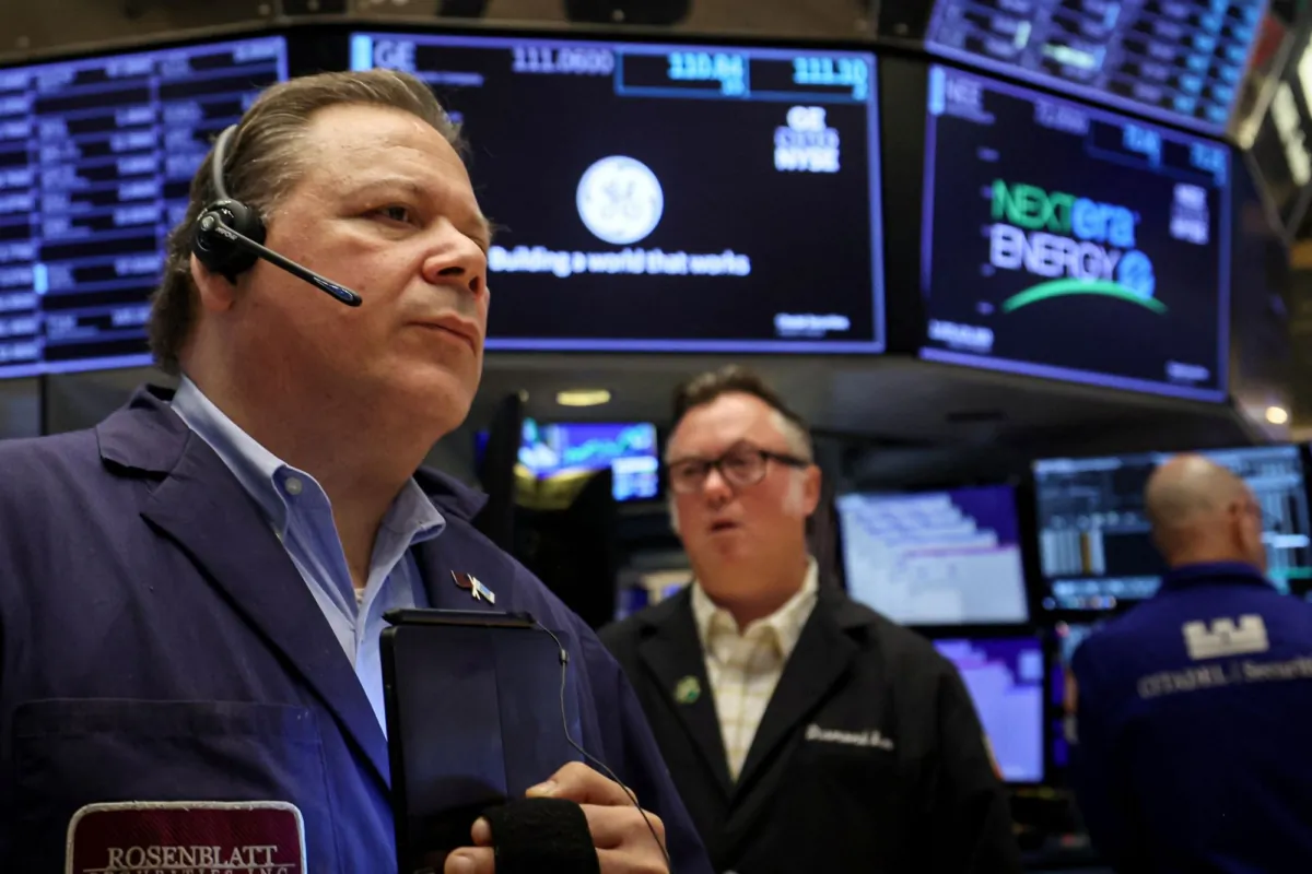 Traders work on the floor of the New York Stock Exchange (NYSE) in New York City on July 19, 2023. (Brendan McDermid/Reuters)