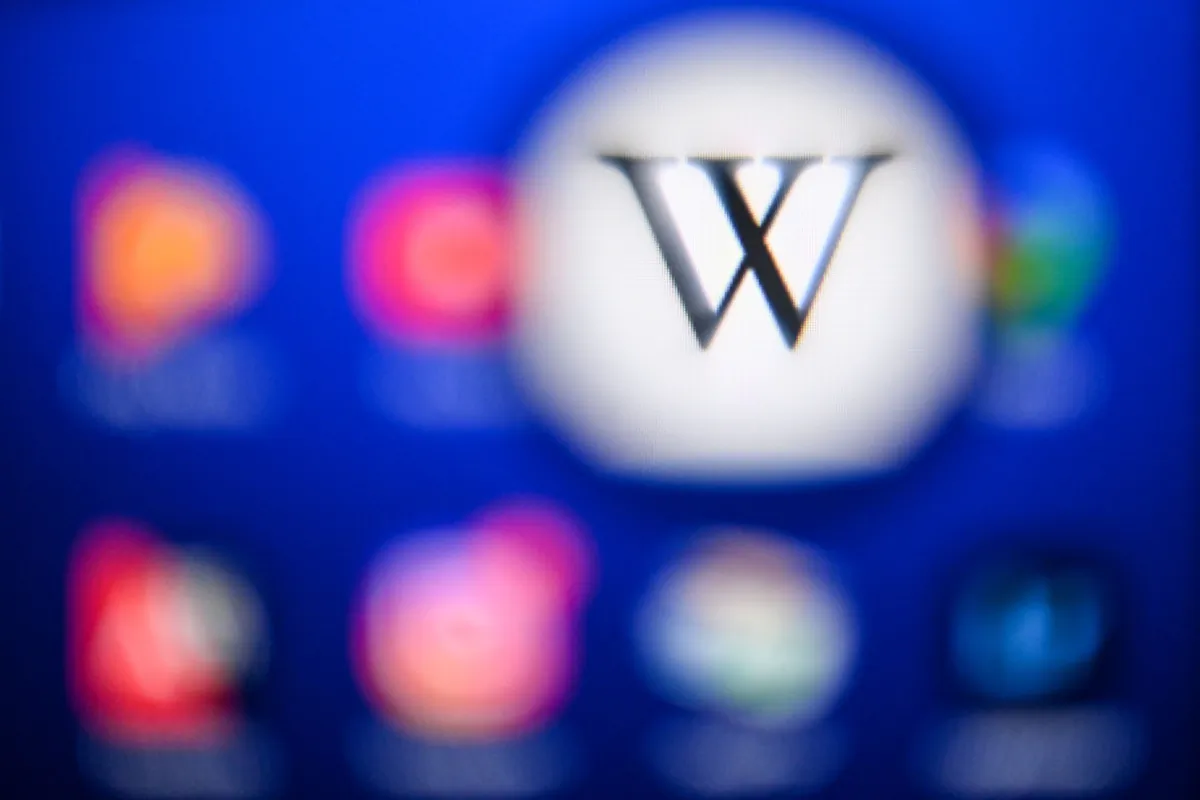 The Wikipedia logo is seen on a tablet screen in Moscow on April 15, 2022. (Kirill Kudryavtsev/AFP via Getty Images)