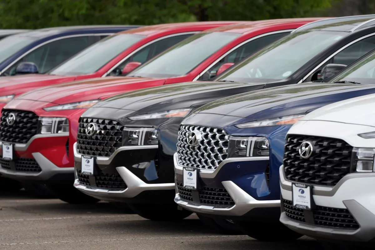 A line of 2022 Santa Fe SUV's sit outside a Hyundai dealership in Littleton, Colo., on Sept. 12, 2021. (David Zalubowski/AP Photo)