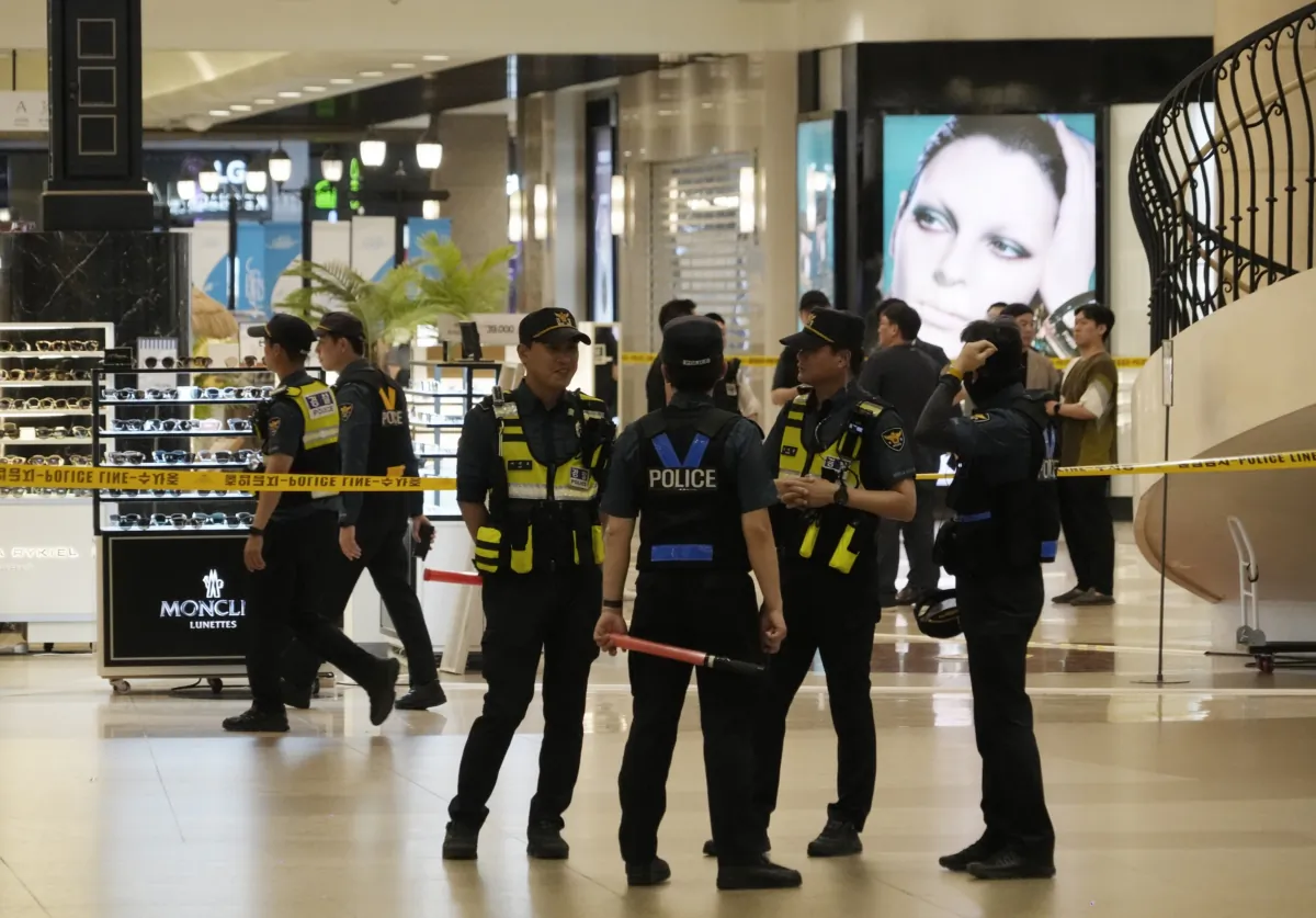 Police officers cordon off the scene near a subway station in Seongnam, South Korea, on Aug. 3, 2023. (Ahn Young-joon/AP Photo)