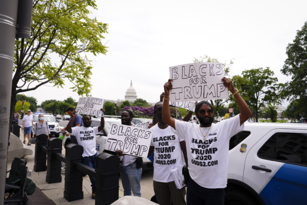 "Blacks for Trump" protesters gather around the E. Barrett Prettyman federal courthouse in Washington on Aug. 3, 2023. (Madalina Vasiliu/The Epoch Times)