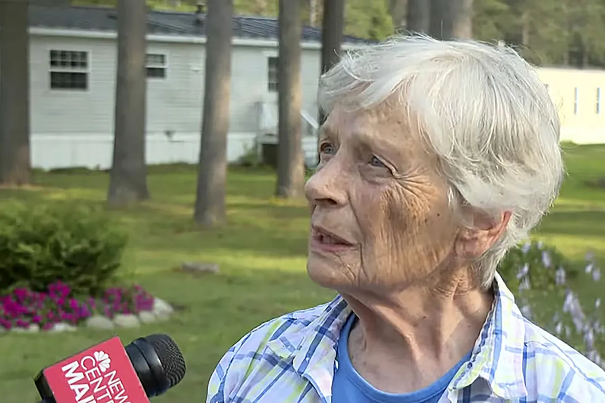 Marjorie Perkins speaks to a reporter at her home in Brunswick, Maine, on Aug. 2, 2023. (News Center Maine via AP)