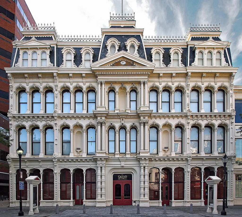 Famed 19th-century architect Thomas Dixon was inspired by the design of the Paris Opera House, which shows off a French Second Empire style, an eclectic compilation of different architectural elements from various time periods. The building's façade impresses with its various arches, Masonic symbols—especially the eye of providence—as well as Corinthian columns, dentil molding adornment, and much more. (Courtesy TheGrandWilmington)