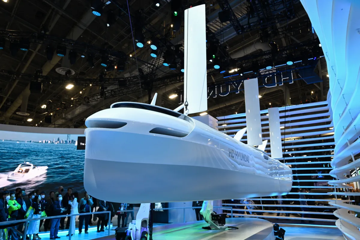 A large-scale concept model of a future LNG carrier ship designed to cross oceans economically and autonomously with OceanWise technology is displayed at the HD Hyundai booth during the Consumer Electronics Show (CES) in Las Vegas, Nevada on January 5, 2023. (Patrick T. Fallon / AFP via Getty Images)