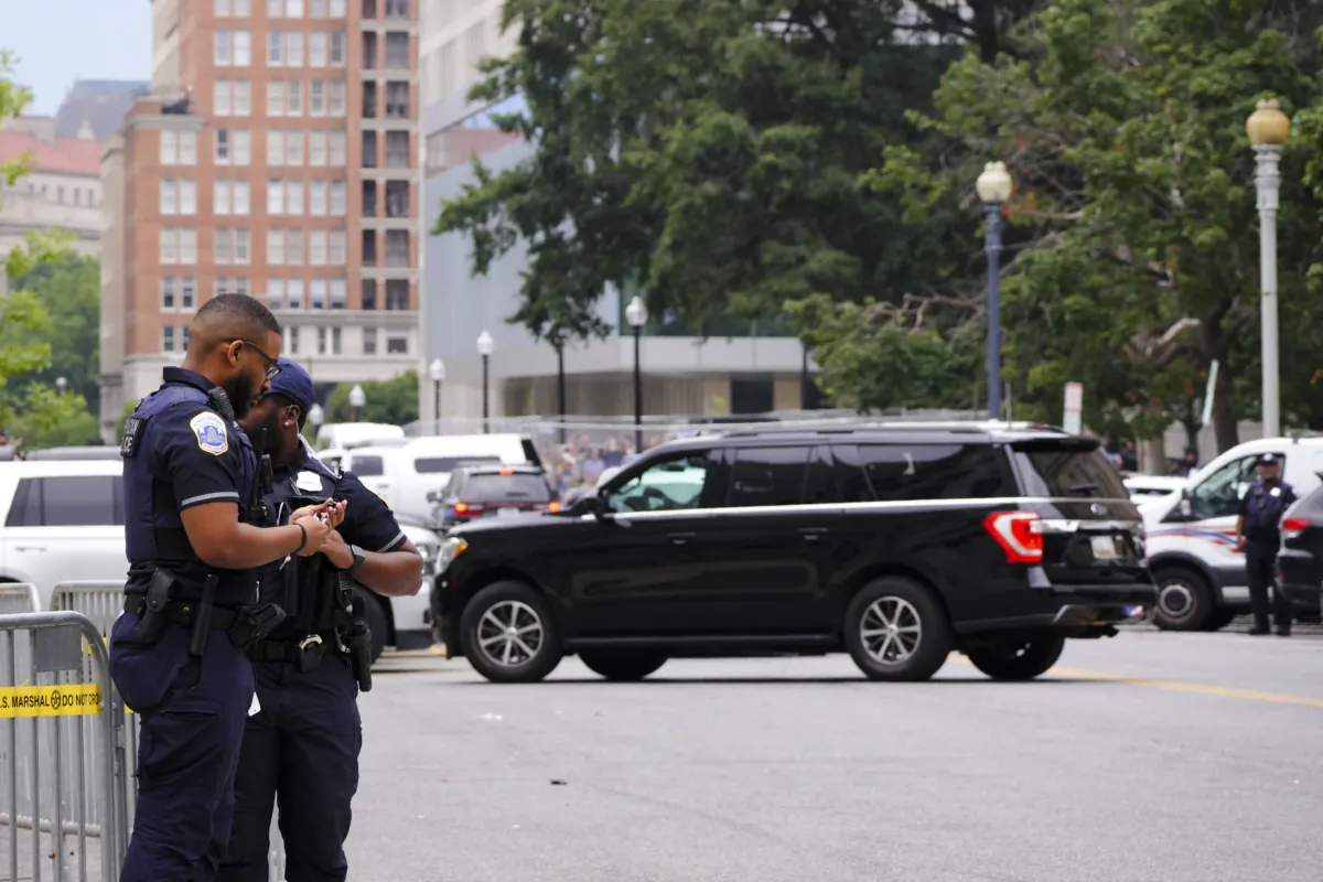 Former President Donald Trump’s motorcade arrives at E. Barrett Prettyman federal courthouse in Washington on Aug. 3, 2023. (Madalina Vasiliu/The Epoch Times)