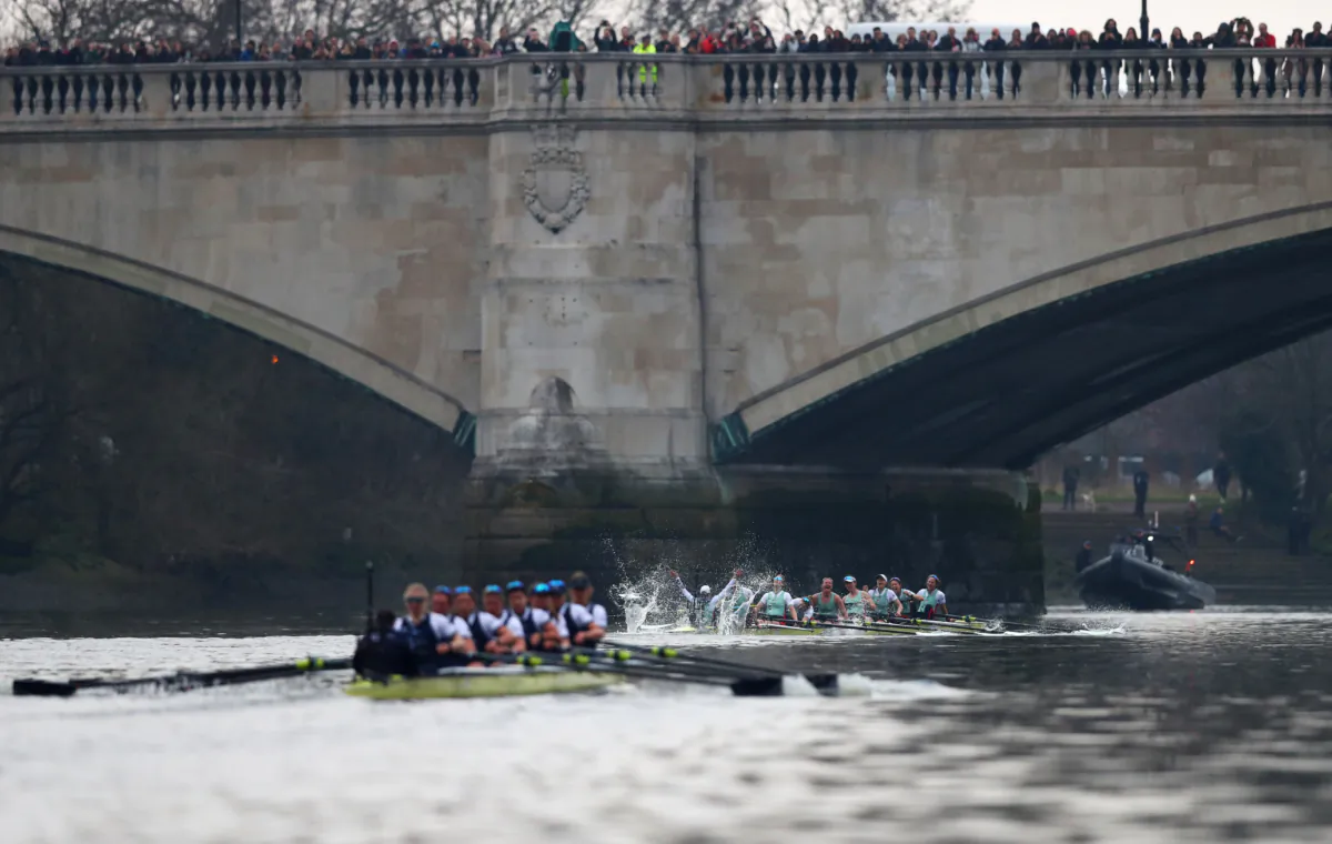The Cambridge University Women's Boat Club Blue crew (R) celebrate race victory over Oxford University Women's Boat Club Blue crew during The Cancer Research UK Womens Boat Race 2018 in London on March 24, 2018. (Naomi Baker/Getty Images)