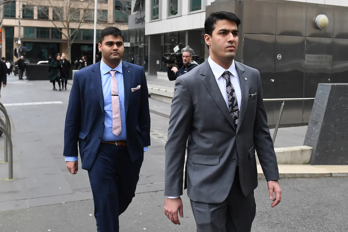 Shaheryer Khan (left) and Obaid Khan (right) leave the County Court of Victoria, in Melbourne, Aug. 4, 2023. (AAP Image/Morgan Hancock)