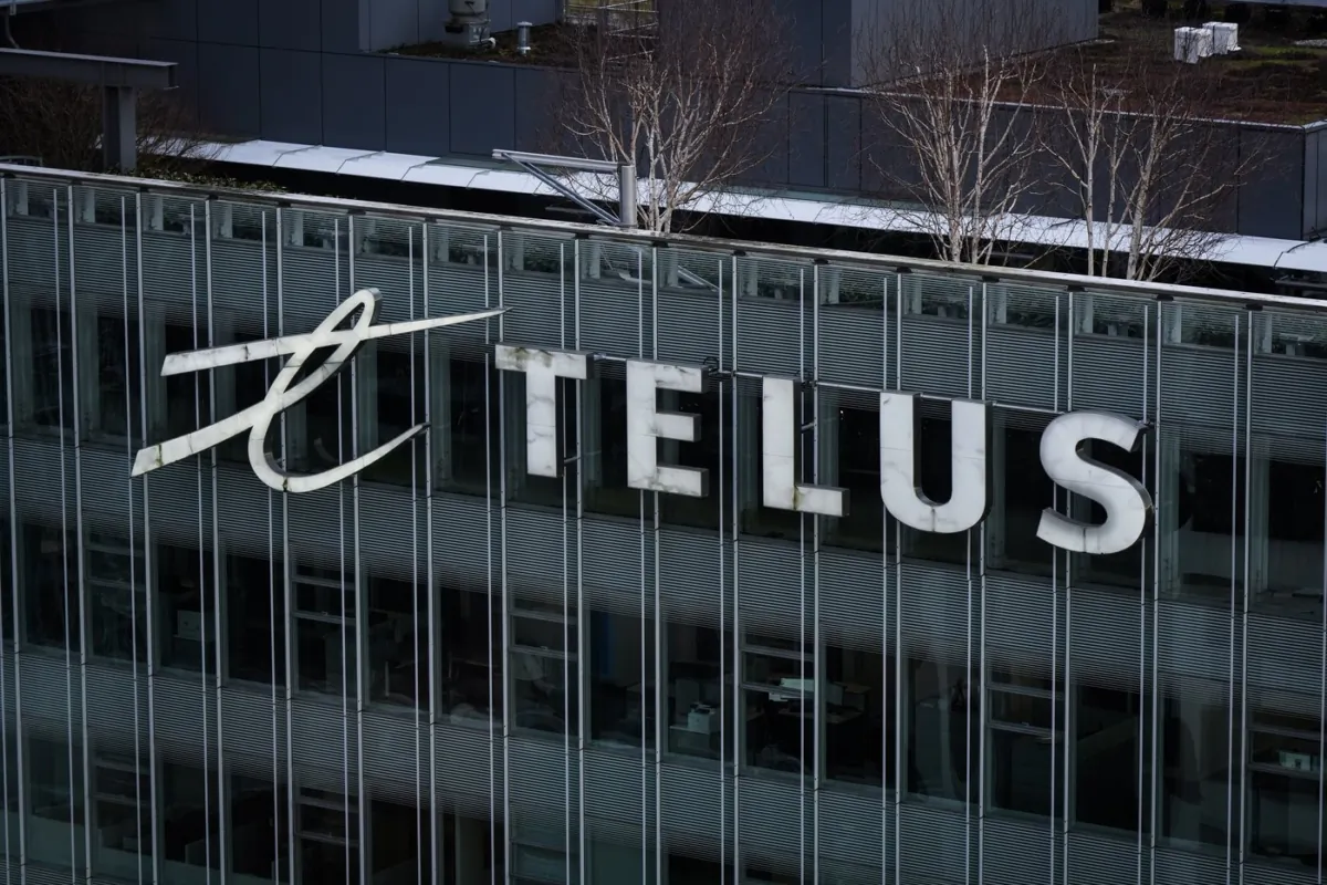 The Telus Corporation logo is seen on the outside of the company's headquarters in downtown Vancouver, on Jan. 19, 2023. (The Canadian Press/Darryl Dyck)
