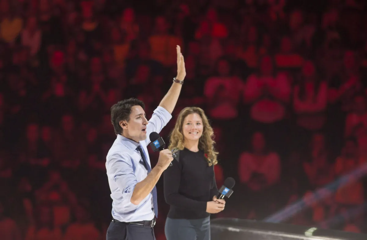 Prime Minister Justin Trudeau and his wife Sophie Gregoire-Trudeau appear at the WE Day celebrations in Ottawa on Nov. 10, 2015. (The Canadian Press/Adrian Wyld)