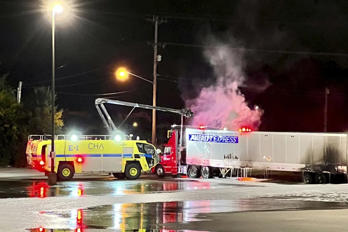 Emergency responders extinguish a fire in a tractor trailer carrying organic peroxide and sodium hydroxide chemicals in Hamilton County, Tenn., on Aug. 3, 2023. (Chattanooga Fire Dept. via AP)