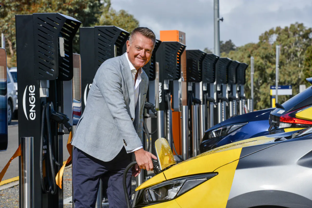 A supplied image obtained on Aug. 4, 2023, of Flinders University Vice-Chancellor Professor Colin Stirling recharging an electric car at the university's Bedford Park campus in South Australia. (AAP Image/Supplied by Flinders University)