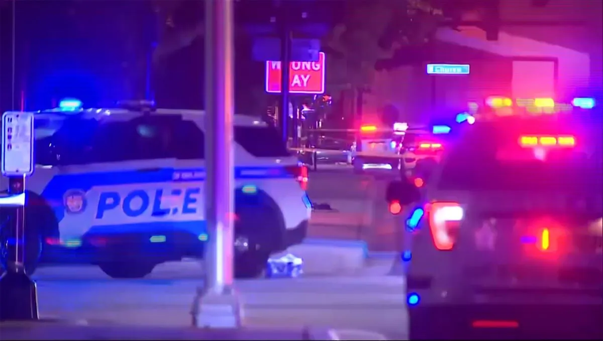 Emergency vehicles near the site of a shooting that critically injured two police officers  in Orlando, Fla., on Aug. 4, 2023, in a still from video. (WFTV via AP)