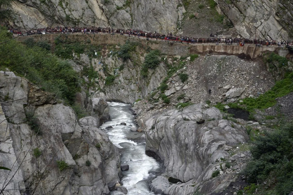 Indian Hindu devotees walk at the restored Kedarnath Temple in Rudraprayag District in northern Uttarakhand state, on June 15, 2017. (Shammi Mehra/AFP via Getty Images)