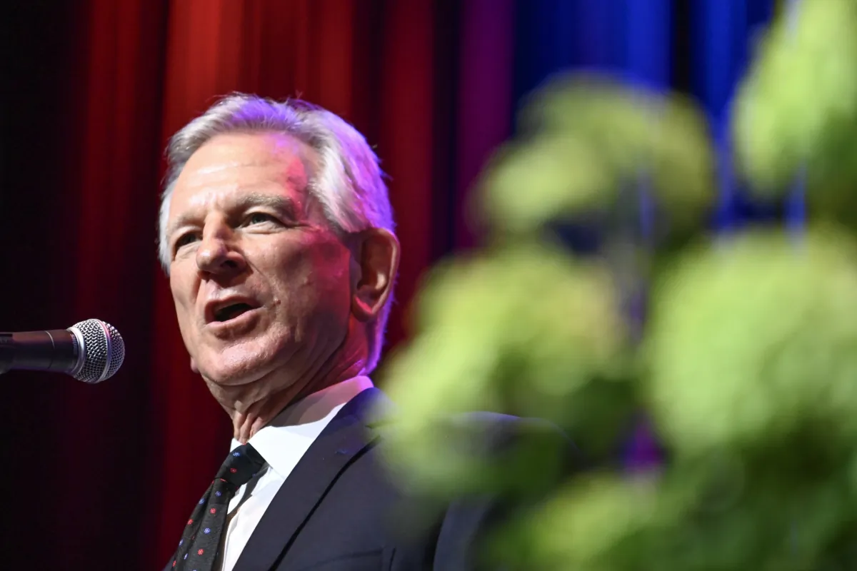 Sen. Tommy Tuberville (R-Ala.) introduces former President Donald Trump to members of the Alabama GOP during their summer meeting in Montgomery, Ala., on Aug. 4, 2023. (Julie Bennett/Getty Images)