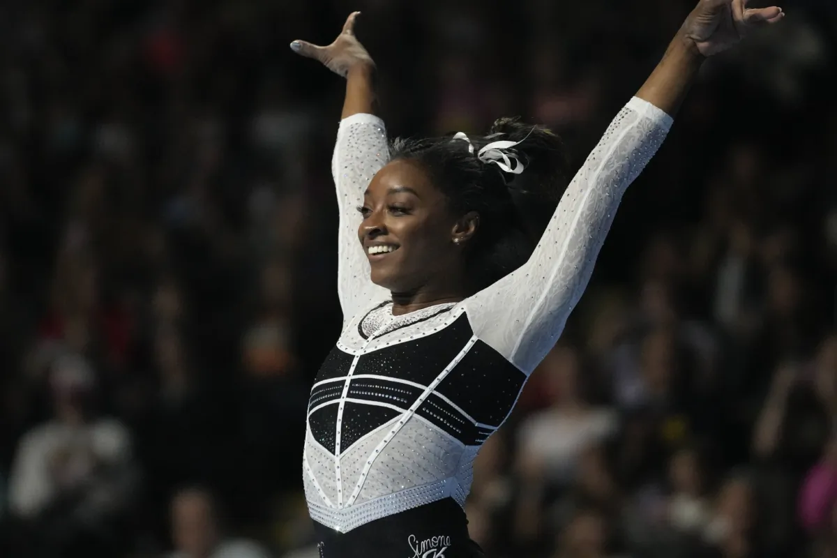 Simone Biles reacts after performing in the floor exercise at the U.S. Classic gymnastics competition in Hoffman Estates, Ill.,  on Aug. 5, 2023. (Erin Hooley/AP Photo)
