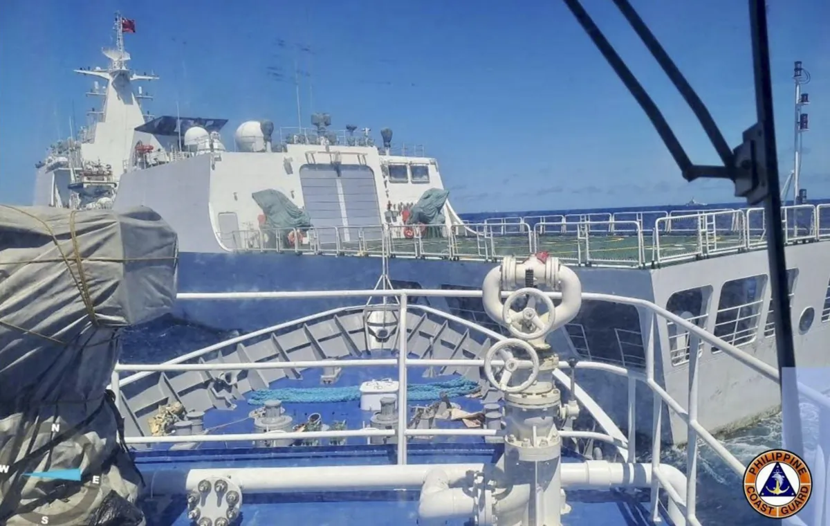 A Chinese Coastguard ship (front) appears to block the path of a Philippine Coast Guard ship near the Philippine-occupied Second Thomas Shoal, South China Sea, on Aug. 5, 2023, during a re-supply mission. (Philippine Coast Guard via AP)