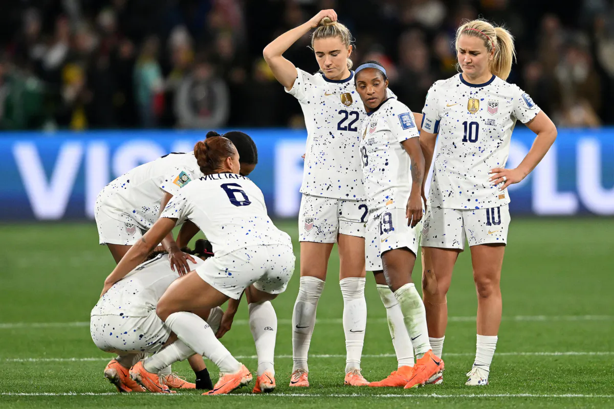 US players show dejection after the team's defeat through the penalty shootout in the FIFA Women's World Cup round of 16 soccer match between Sweden and the United States at Melbourne Rectangular Stadium in Melbourne, Australia on Aug. 6, 2023. (Quinn Rooney/Getty Images)