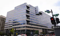 IMF Lowers Global Growth Forecast